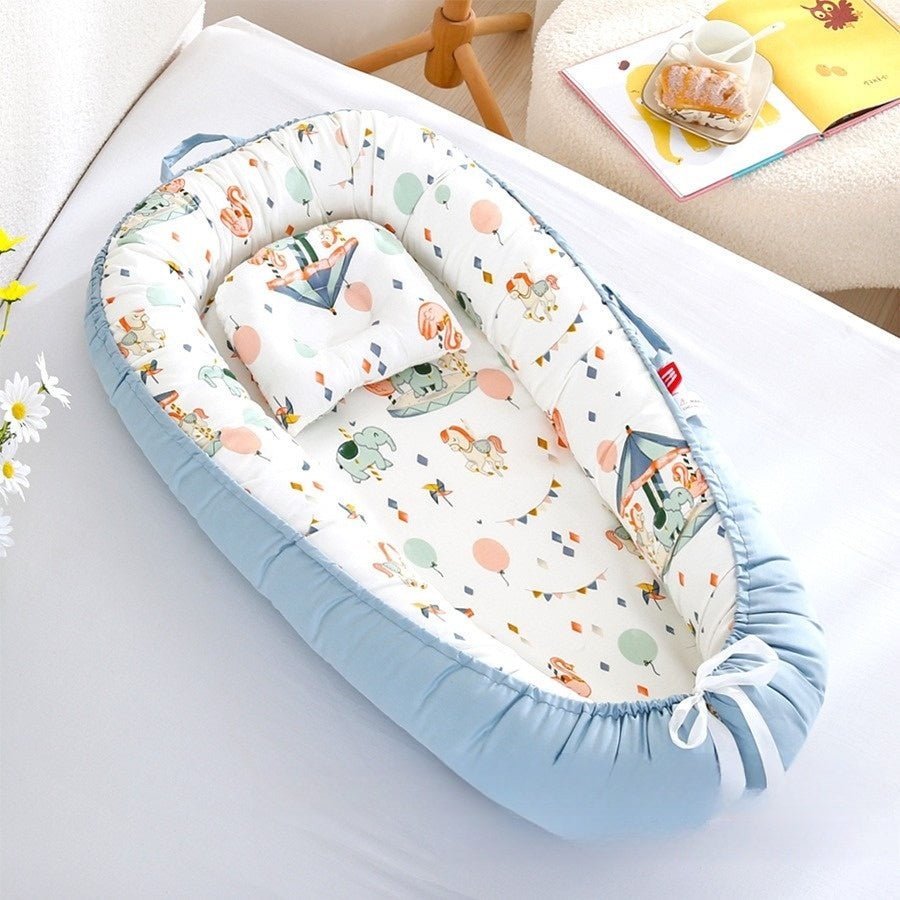Réducteur de lit bébé