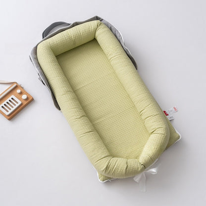 bebe re ducteur delit voyage vert