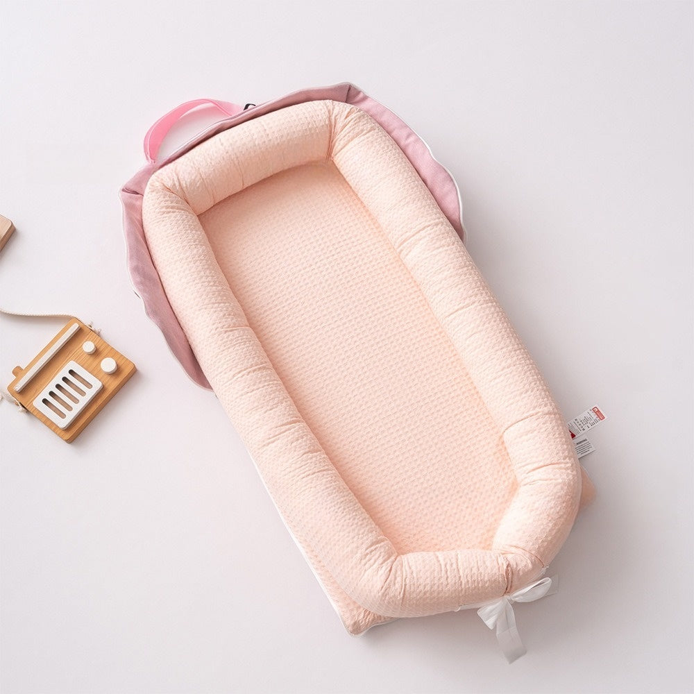 bebe reducteur de lit rose 