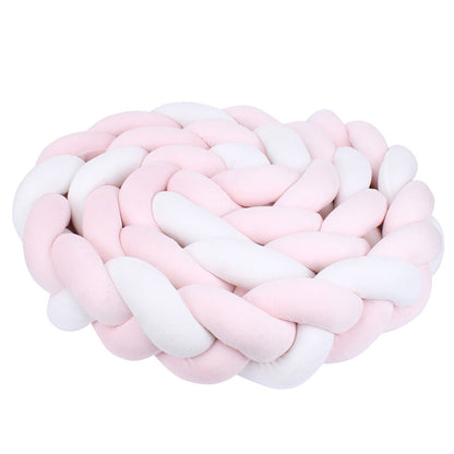 tresse de lit bebe rose et blanc enroulee