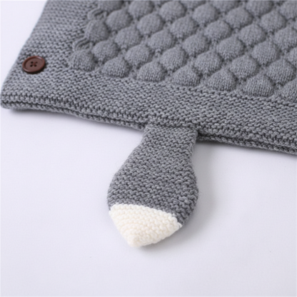 Nid d'ange bébé gris tricoté