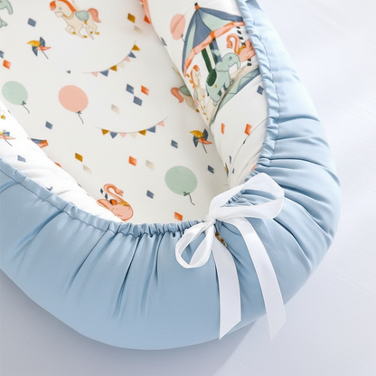Réducteur de lit bébé